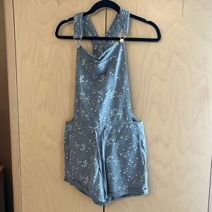 Gray with white stars, short overalls.